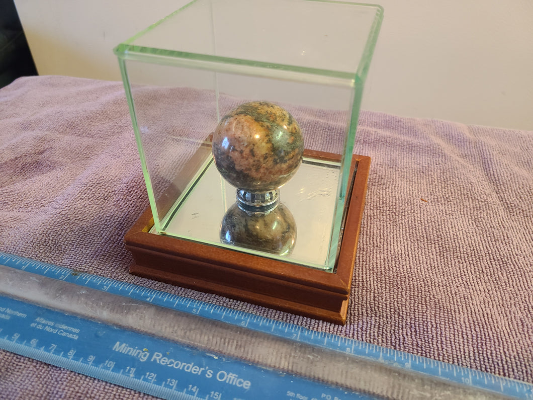 Large Sphere with Display Case